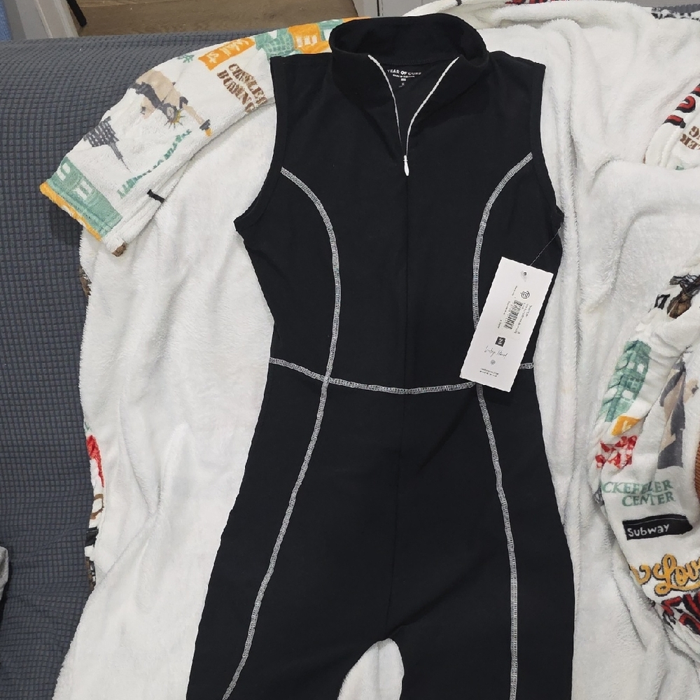 Black Sleeveless Jumpsuit with White Stitching